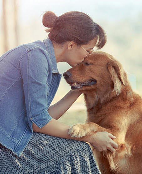 Woman with a golden retriever